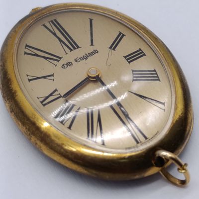 Vintage old England Oval mechanical pendant watch in gold tone case - Swiss movement - late 1960's