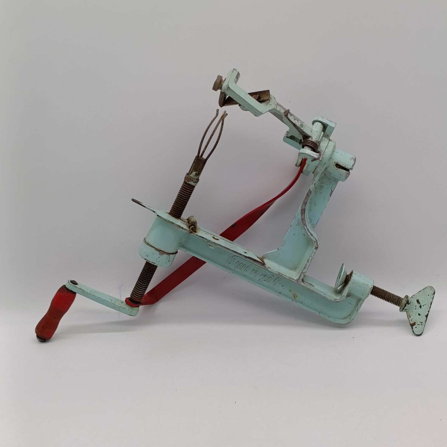 Vintage Swingit hand crank fruit peeler