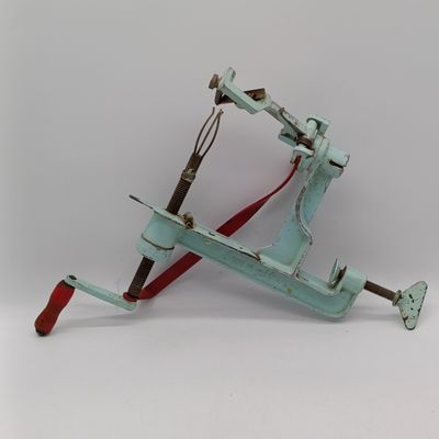 Vintage Swingit hand crank fruit peeler