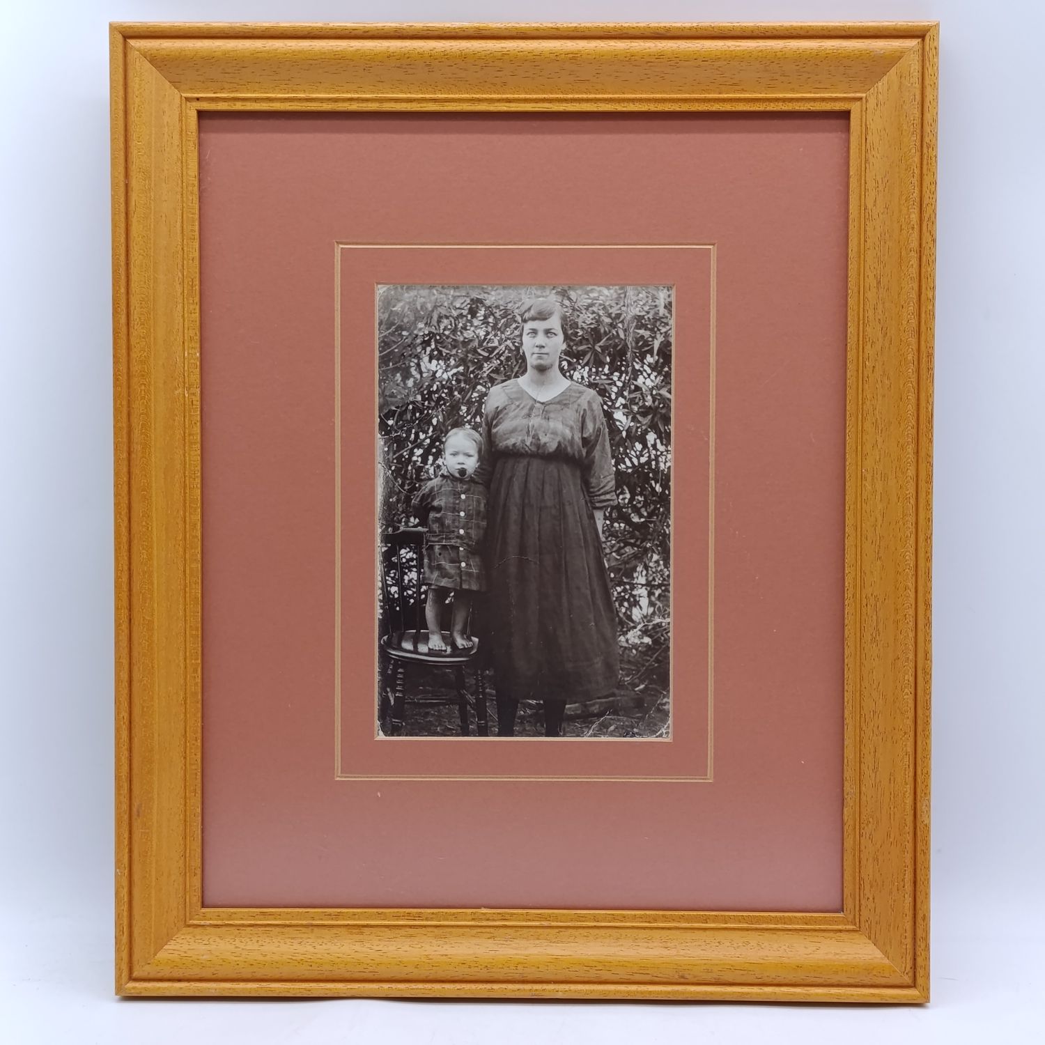 Antique photo of mother and child - Child has smoking pipe in mouth