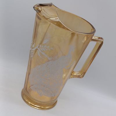 Vintage Jeannette glass Company iridescent marigold carnival glass milk jug/pitcher with peacock design