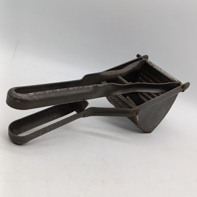Vintage Potato masher - repaired