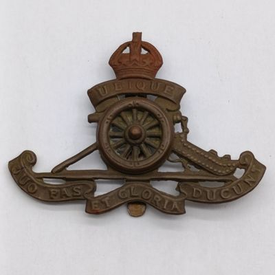 Old type artillery cap badge with revolving wheel - scarce type - slide intact - 1902-1952