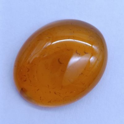 Cabochon Hessonite Garnet of 8.15ct - Also called cinnamon stone, with honey-in-water effect - 17mm x 13.5mm