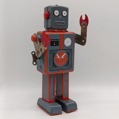 Vintage mechanical wind-up tin robot - working and with key - one ear missing