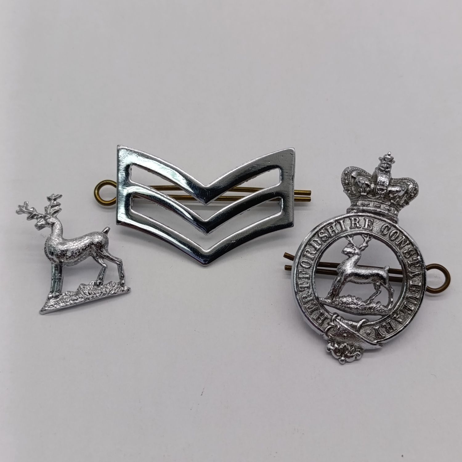 Hertfordshire Constabulary chrome cap badge plus collar badge - also police sergeant rank badge
