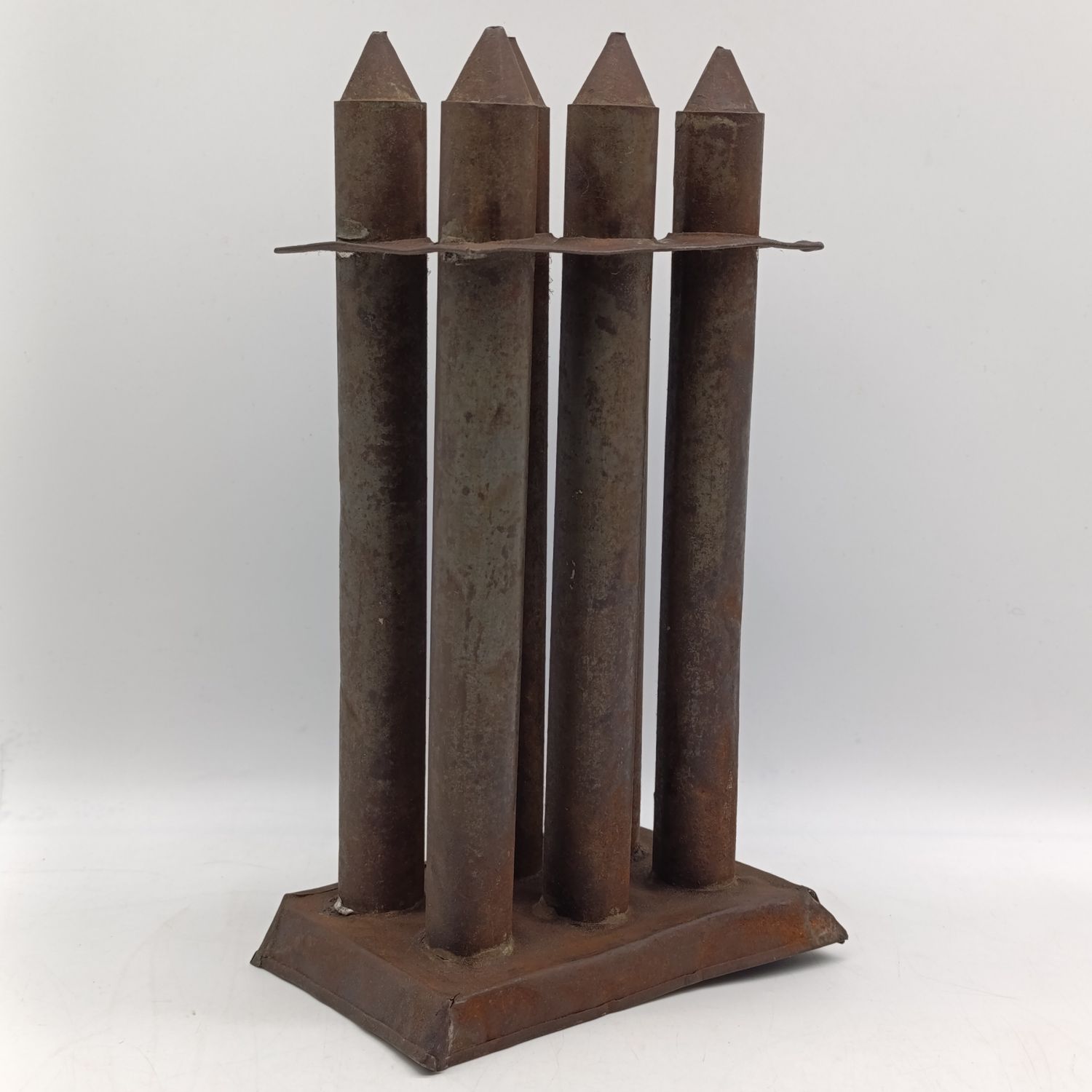 Antique metal 6-tube candle mold