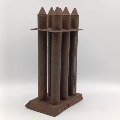 Antique metal 6-tube candle mold