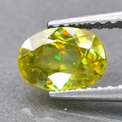 1.21ct 7.2x5.2mm VS Oval Natural Greenish Yellow Sphene Madagascar, High Luster