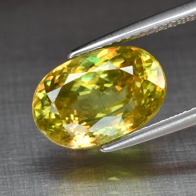 5.91ct 12.2x8.4mm Oval Natural Greenish Yellow Sphene, Amazing Luster