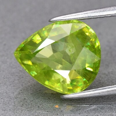 3.13ct 10.5x9mm Pear Natural Yellowish Green Sphene Madagascar, Diamond Luster