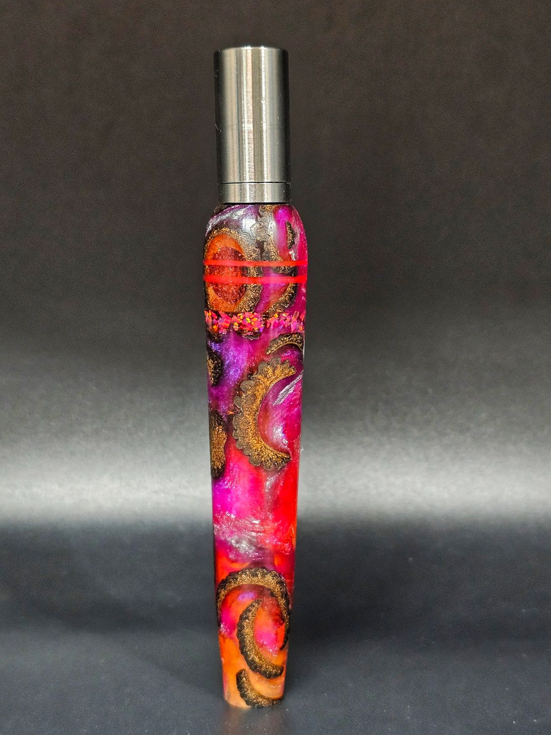 Salmon/silver acorn resin with opal and glow inlay