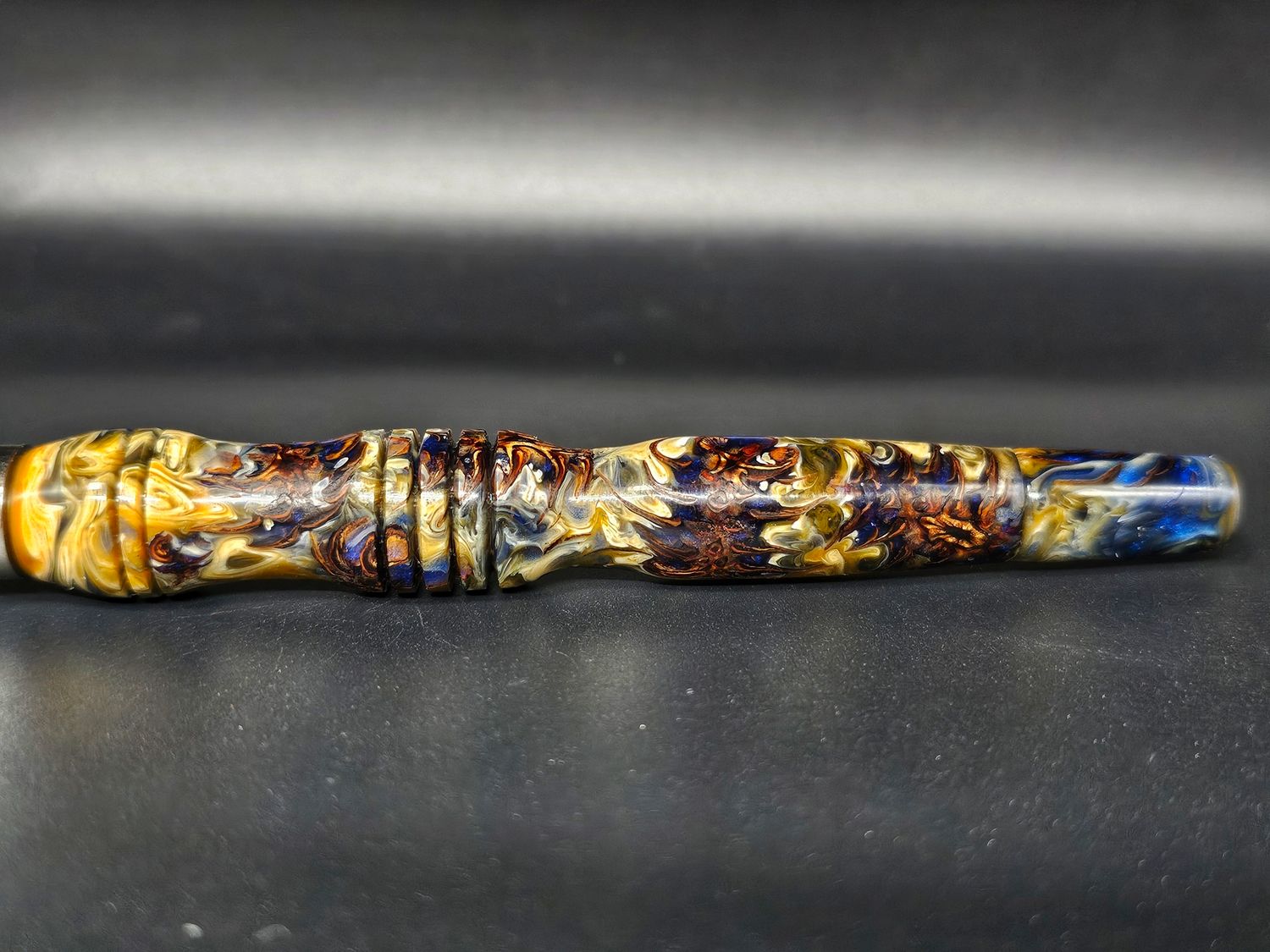 Mini pinecone in resin w/ mouthpiece