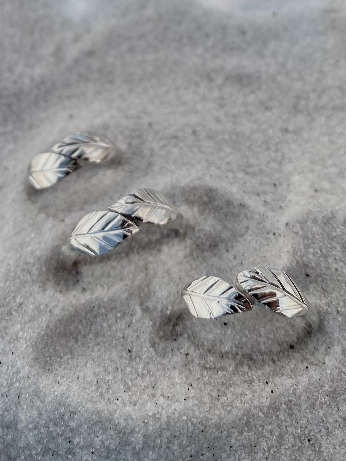 Elegant Leaf: One Sterling Silver Intertwined Leaf Ring