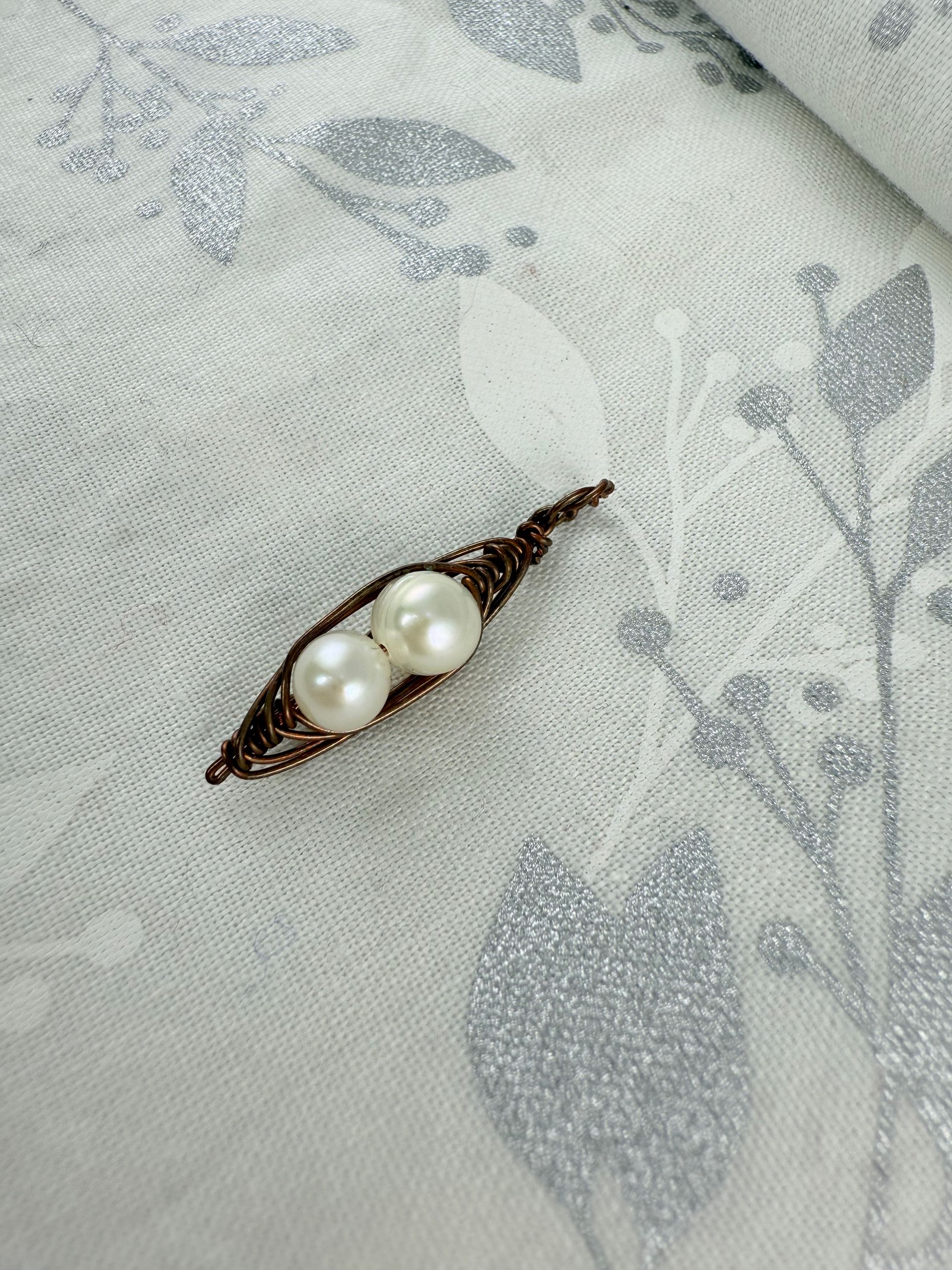 Aged Copper and Freshwater Pod