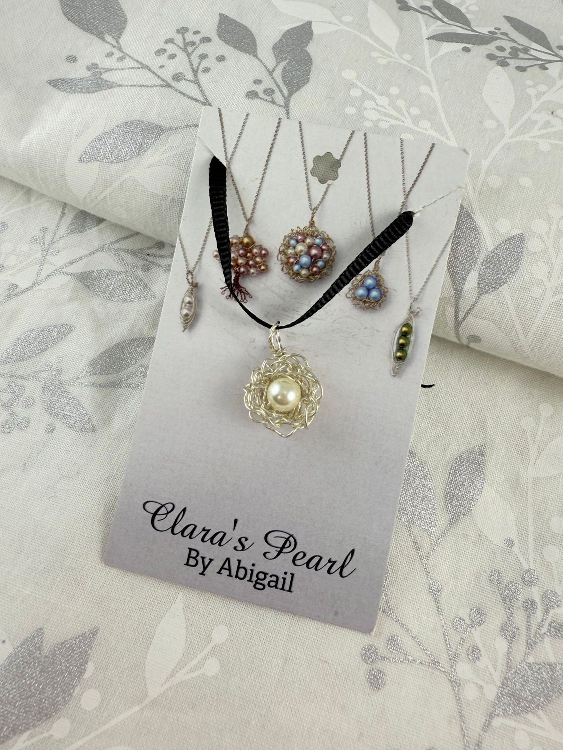 Silver single-pearl nest