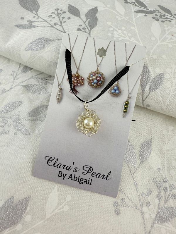 Silver single-pearl nest