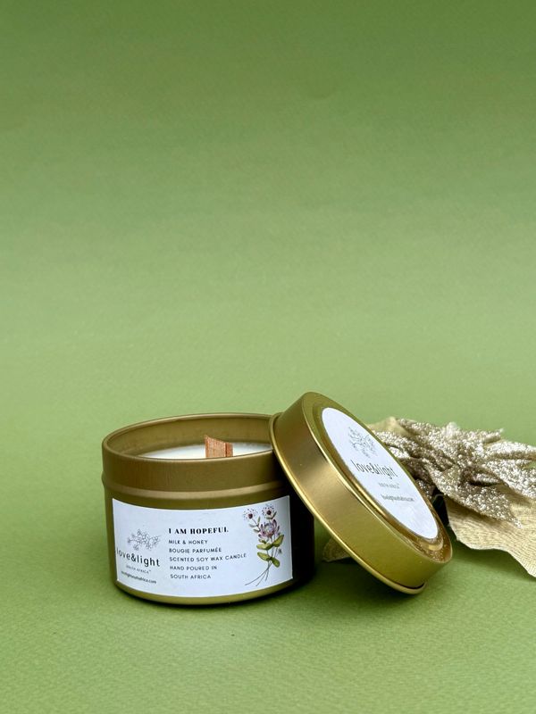 Gold tin Christmas Soy Candle In Milk &amp; Honey