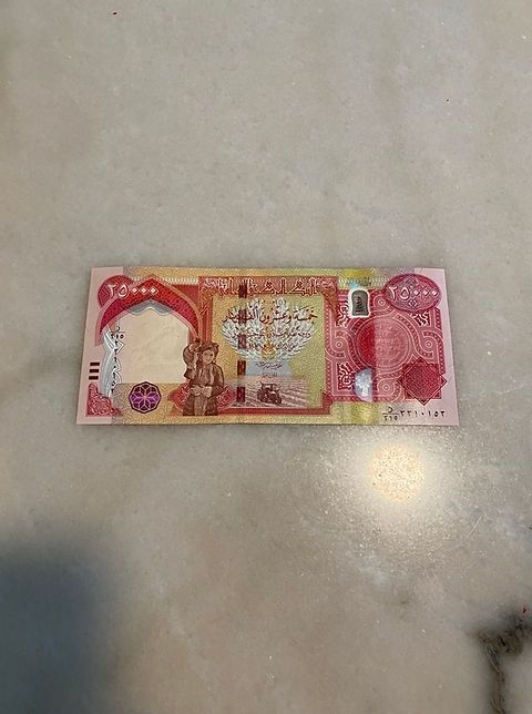 (1) 25,000 Iraqi Dinar Note.