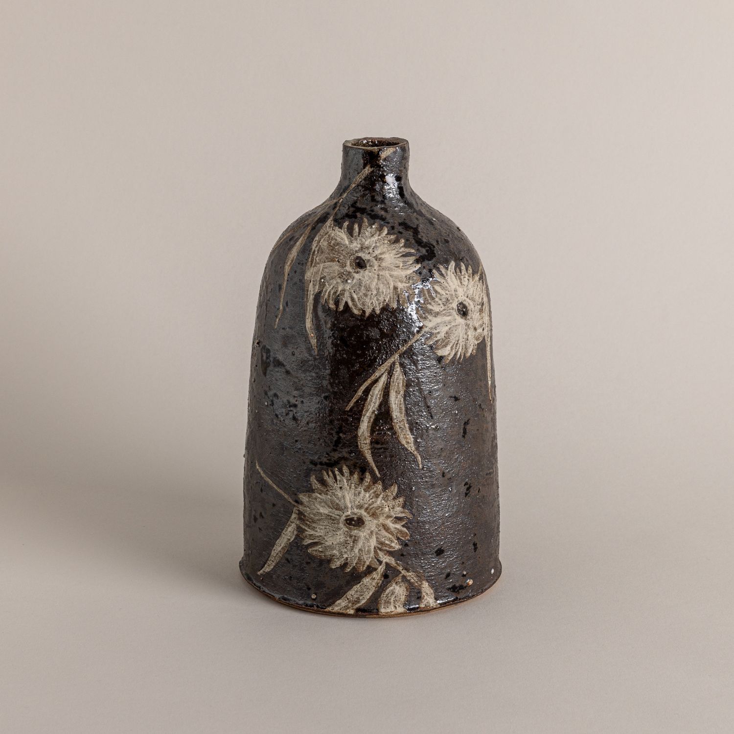 Black Vessel with Eucalyptus Flowers