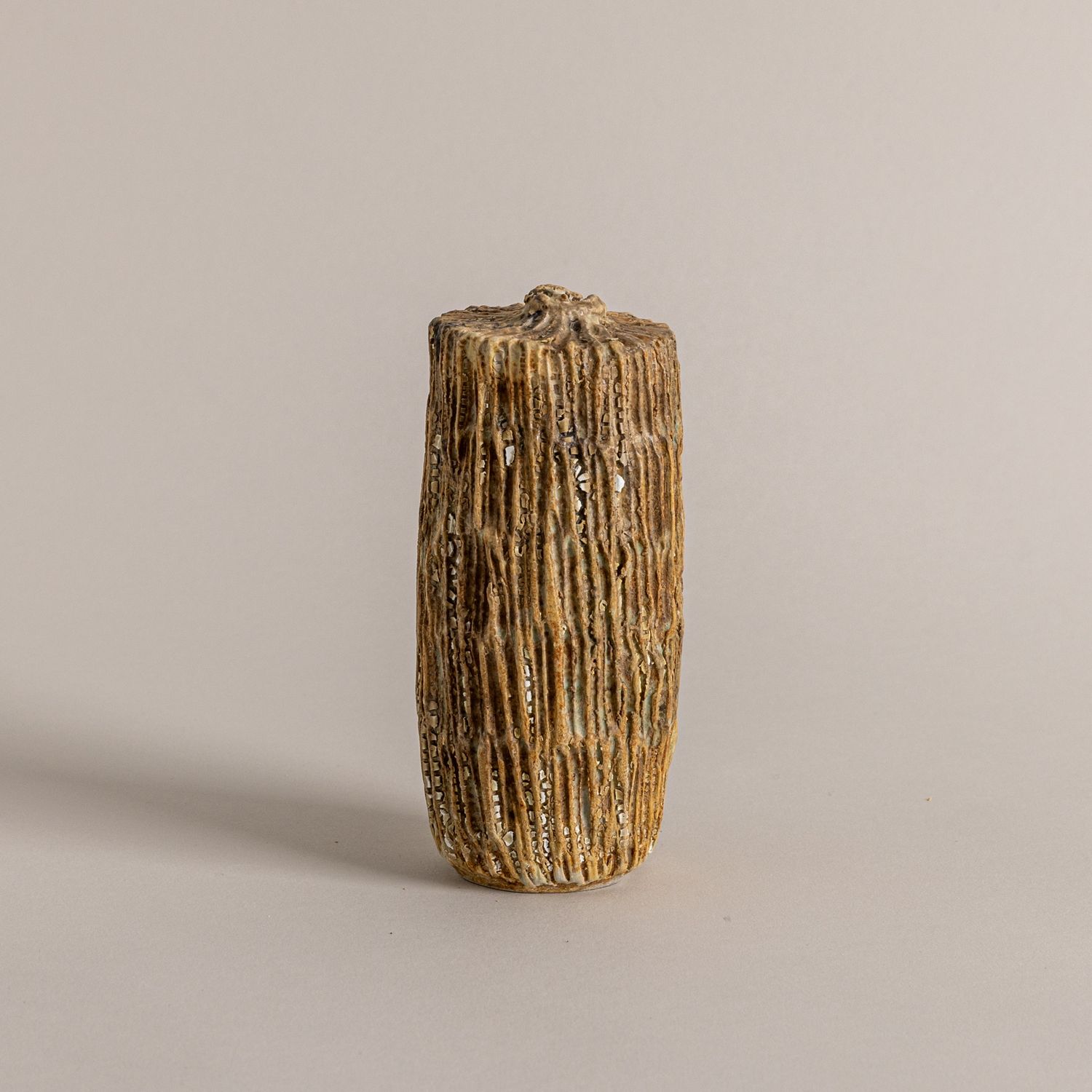 Orche , Rust, and Brown Textured Bottle Form