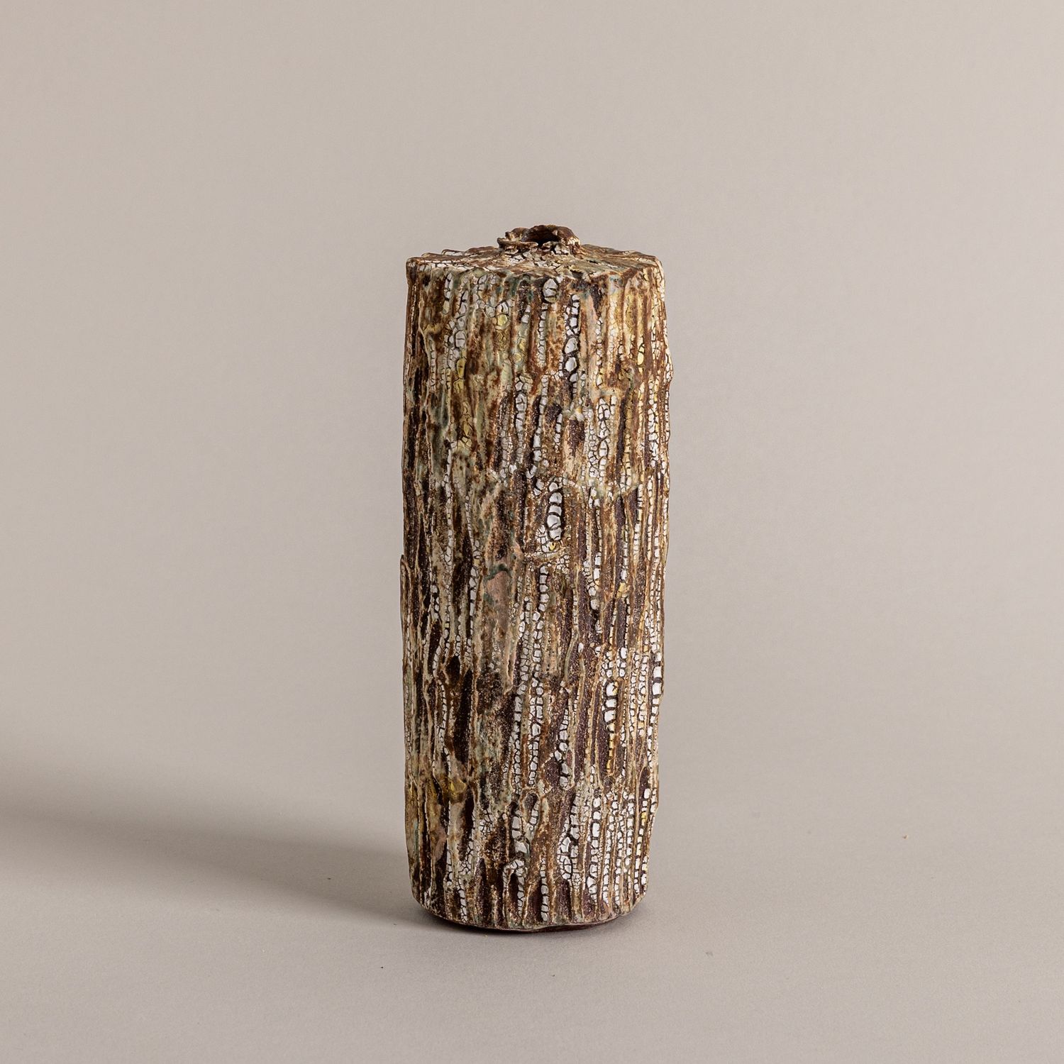 Brown, White, and Rust Textured Bottle Form