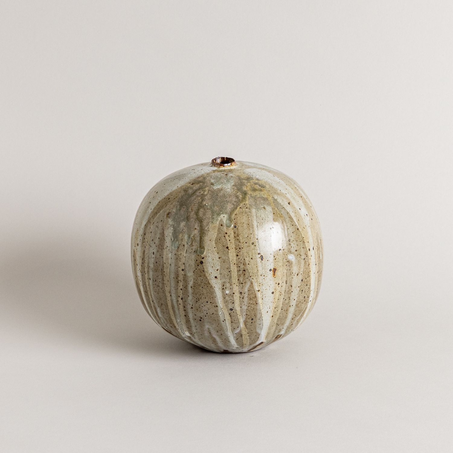 Brown and White Vessel