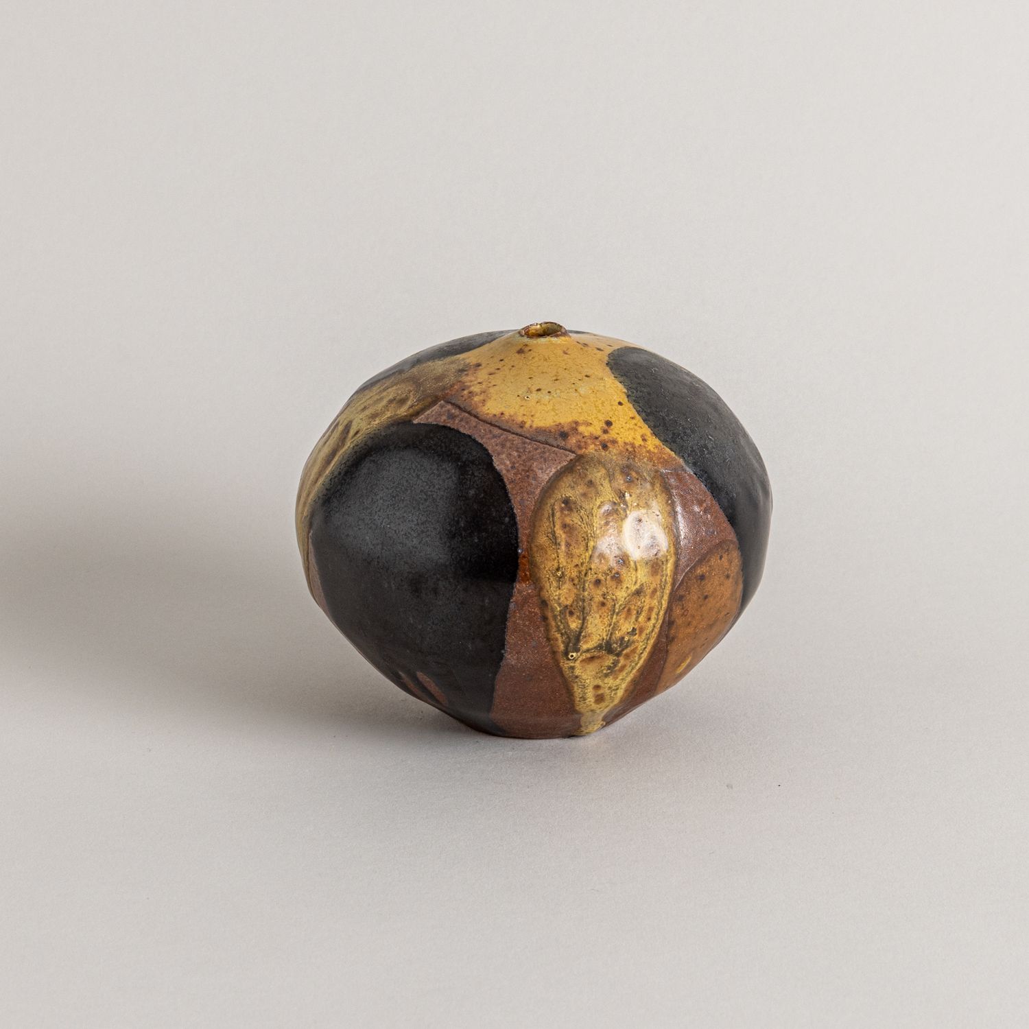 Small Black and Brown Vessel