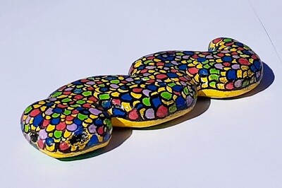 Hand carved and individually painted wooden snake.