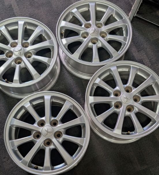 *USED* SET OF 4 GENUINE MITSUBISHI LANCER WHEELS 16x6.5 *USED* SET OF 4 GENUINE MITSUBISHI LANCER WHEELS 16x6.5" 5x114.3 ET: 45P SILVER