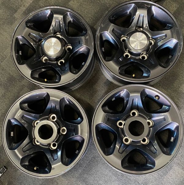 *TAKE OFF* SET OF 4 GENUINE OEM TOYOTA LANDCRUISER 79 SERIES GUNMETAL WHEELS. 16 *TAKE OFF* SET OF 4 GENUINE OEM TOYOTA LANDCRUISER 79 SERIES GUNMETAL WHEELS. 16"x 7". PCD: 5/150