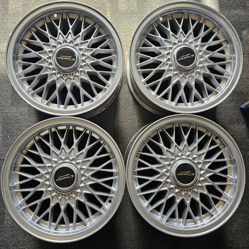 *USED* SET OF 4 CHEVIOT MESH-STYLE WHEELS 15x7" PCD: 5x114.3 ET: 22P - SUIT 2WD HILUX