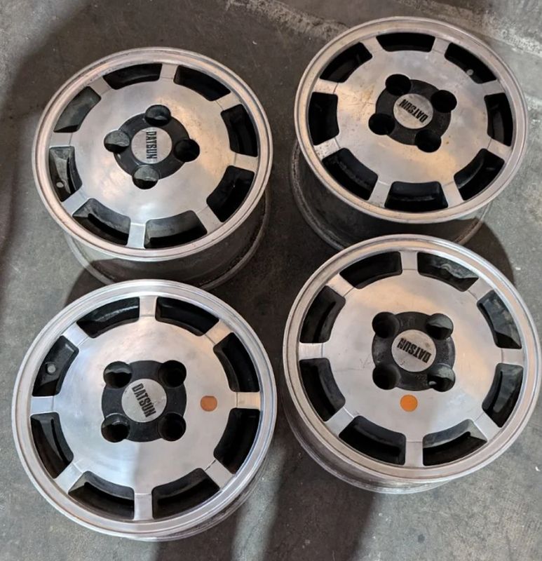 *USED* OLD SCHOOL ALLOY DATSUN WHEELS 13x6" - BLACK/SILVER PCD: 4x114.3 ET: 20P