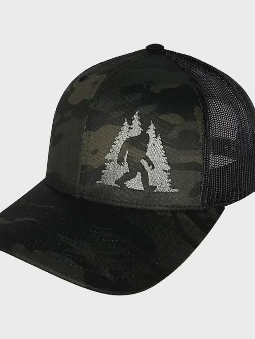 Sasquatch in Trees Curved Bill Trucker