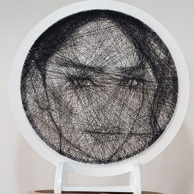 FaceLyne Majestic personalized string art portrait in a freestanding round frame