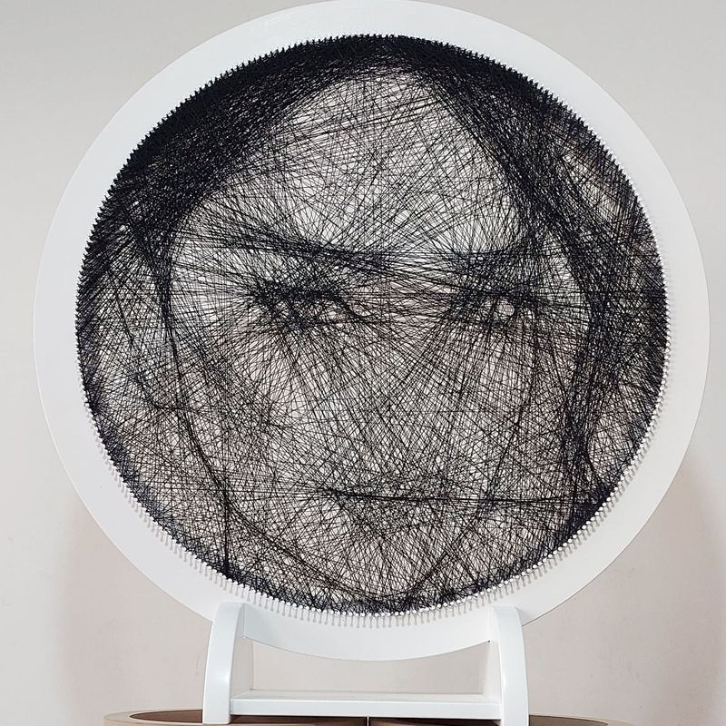 FaceLyne Majestic personalized string art portrait in a freestanding round frame