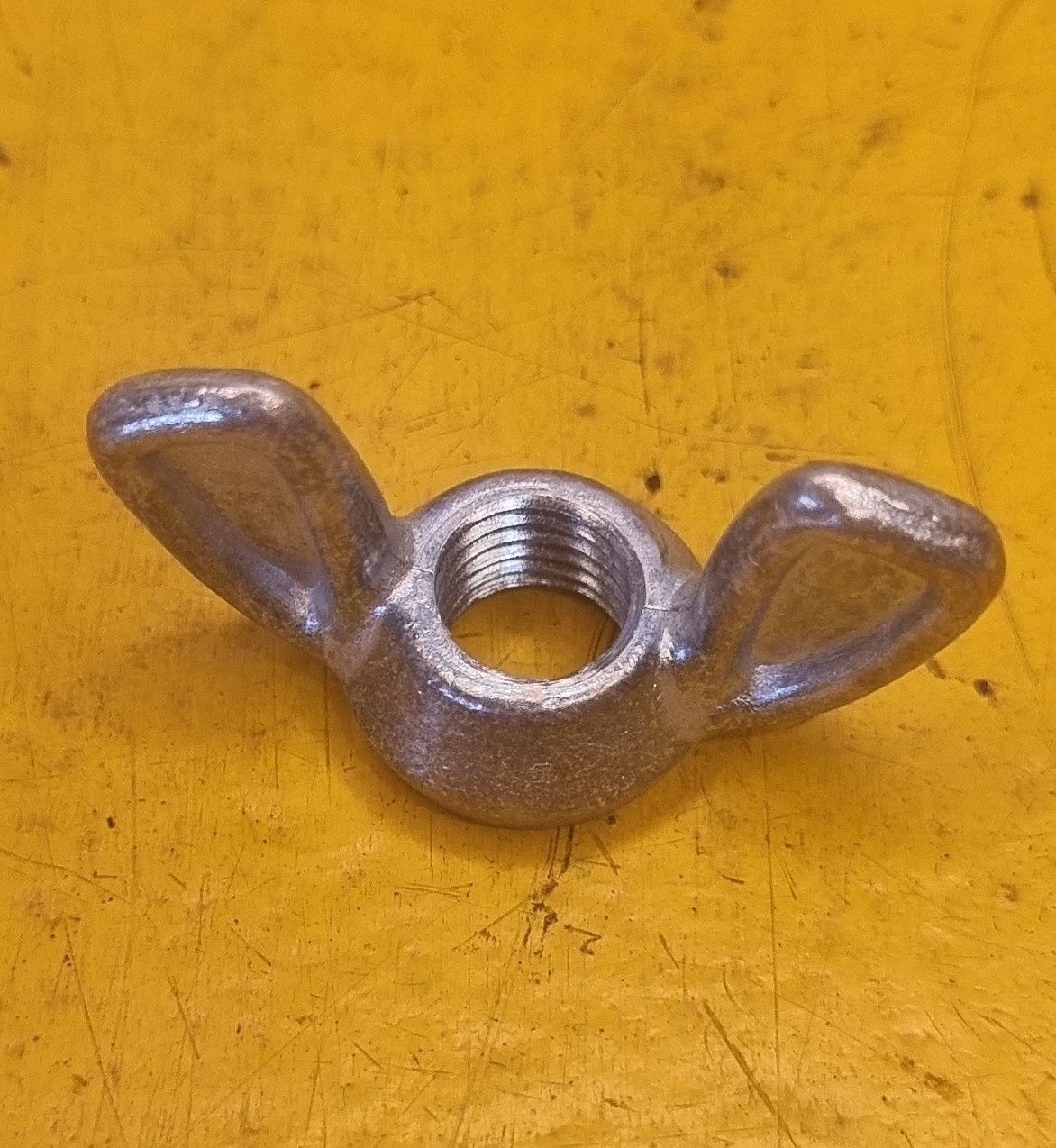 NUT 5/16 UNC WING ZINC
