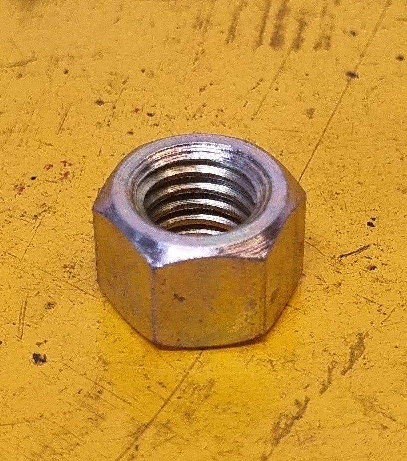 NUT 7/16 UNC MANIFOLD STEEL