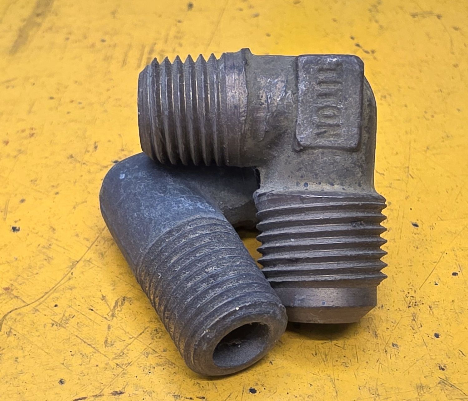 BRASS 45 DEG FLARE 90 DEG MALE ELBOW 3/8 TUBE X 1/4 NPT