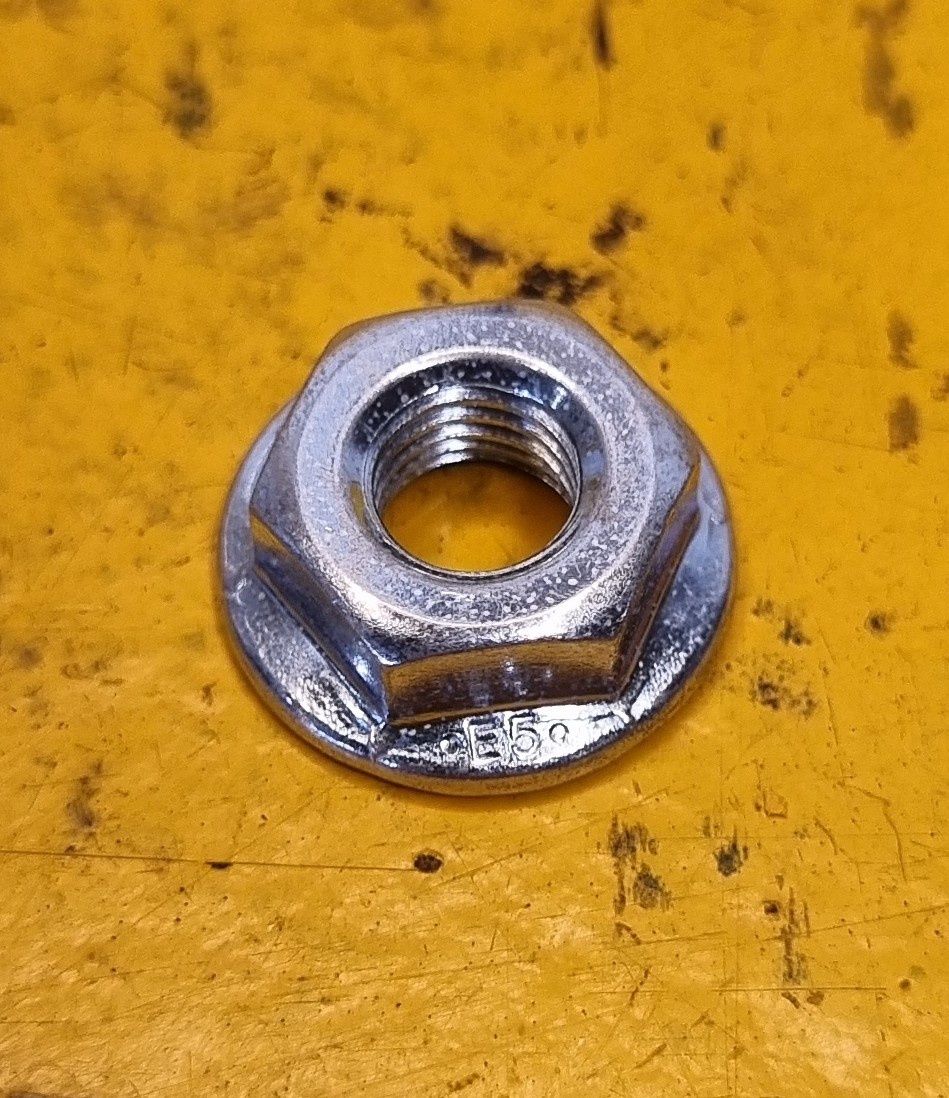 NUT FLANGE SERRATED 1/4 UNF ZINC