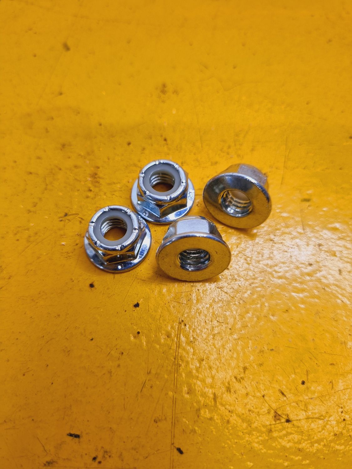 NUT 5/16 UNC FLANGE NYLOCK YZP CL10