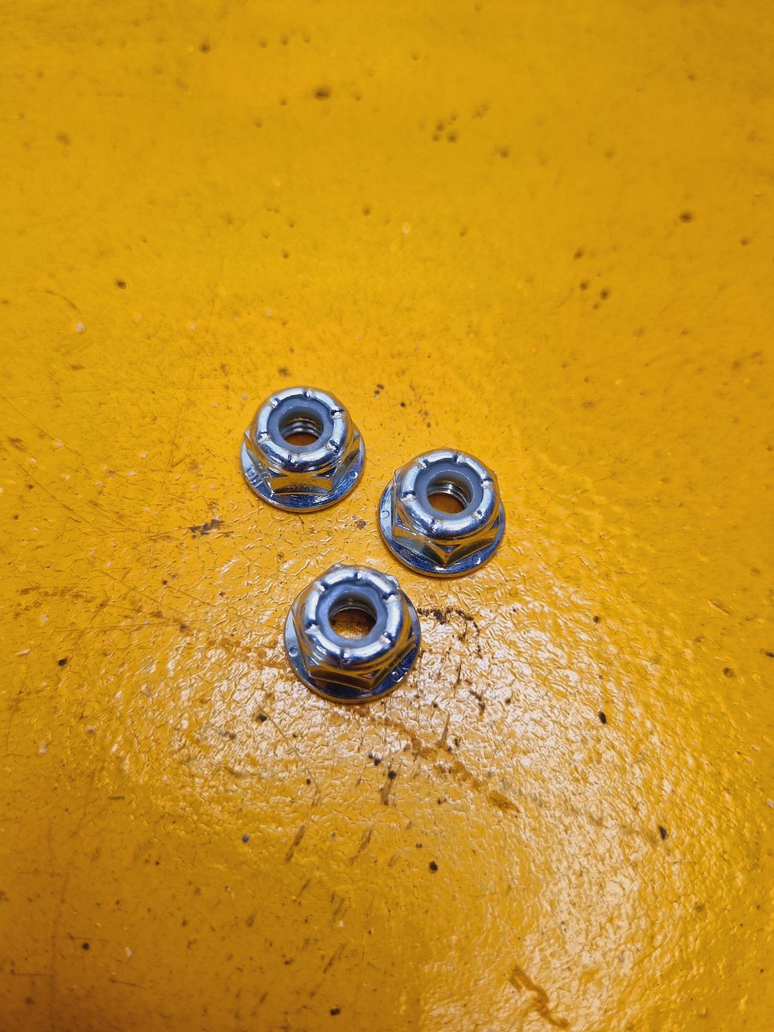 NUT 1/4 UNC FLANGE NYLOCK YZP CL10