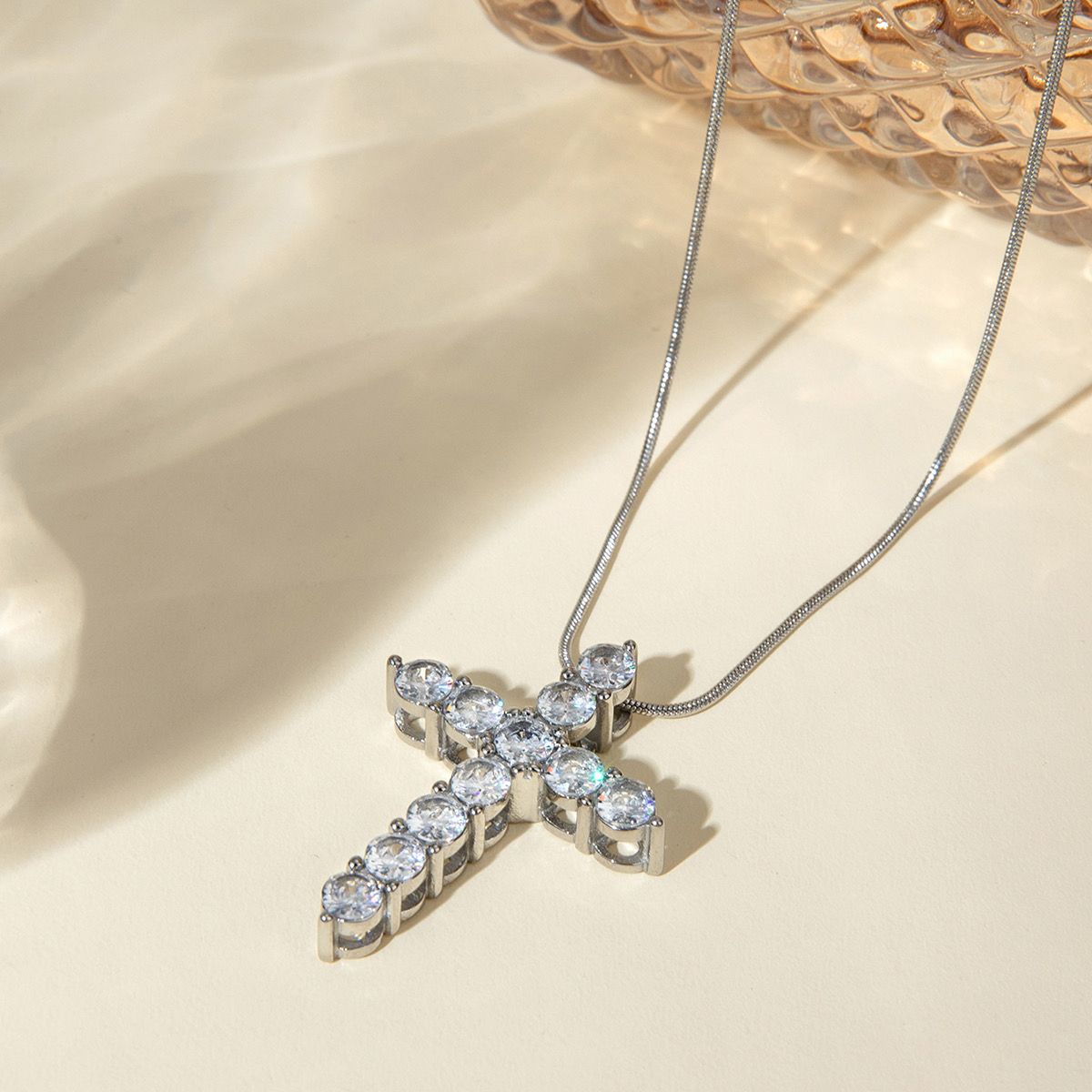 Silver cross with zircon
