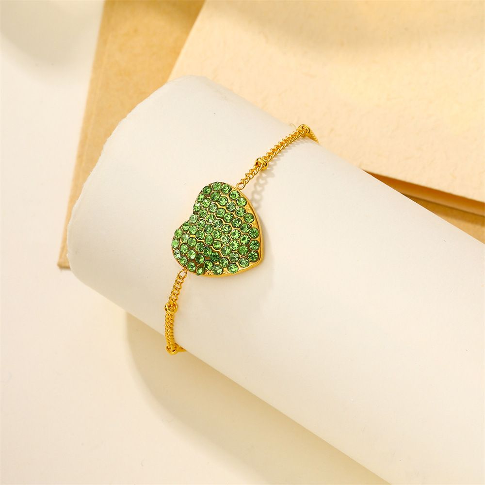 Green heart gold bracelet