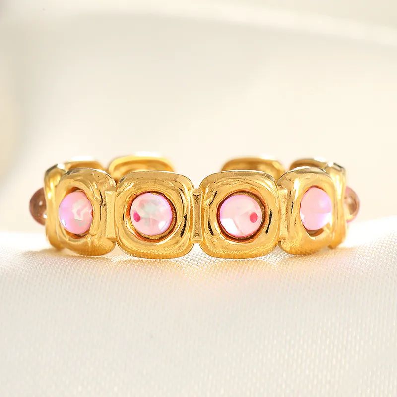 Gold ring with pink zircon