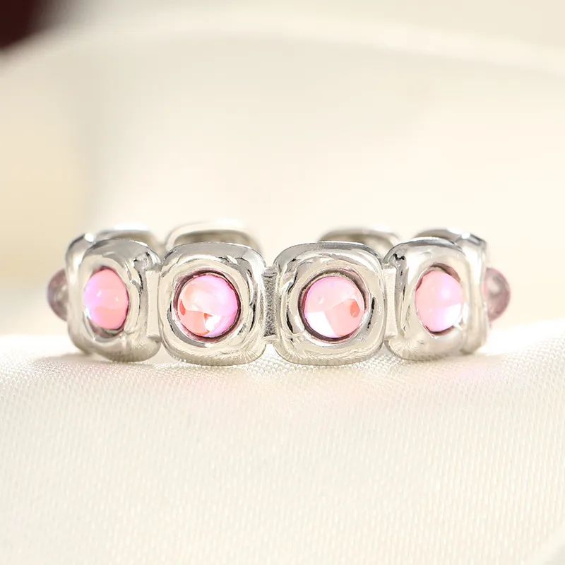Silver ring with pink zircon