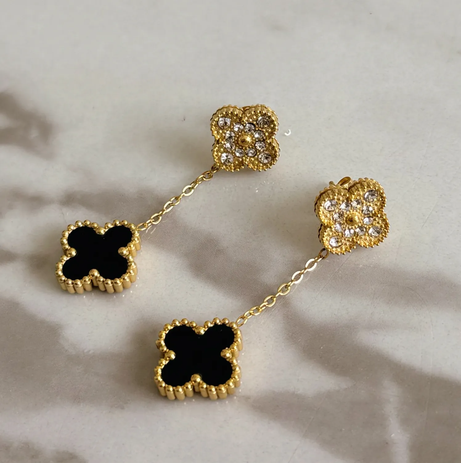 Van Cleef earrings with zircon