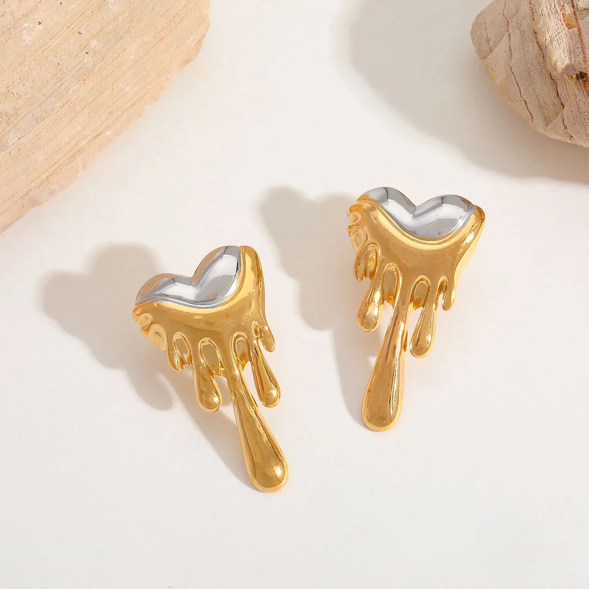 Silver and gold earrings