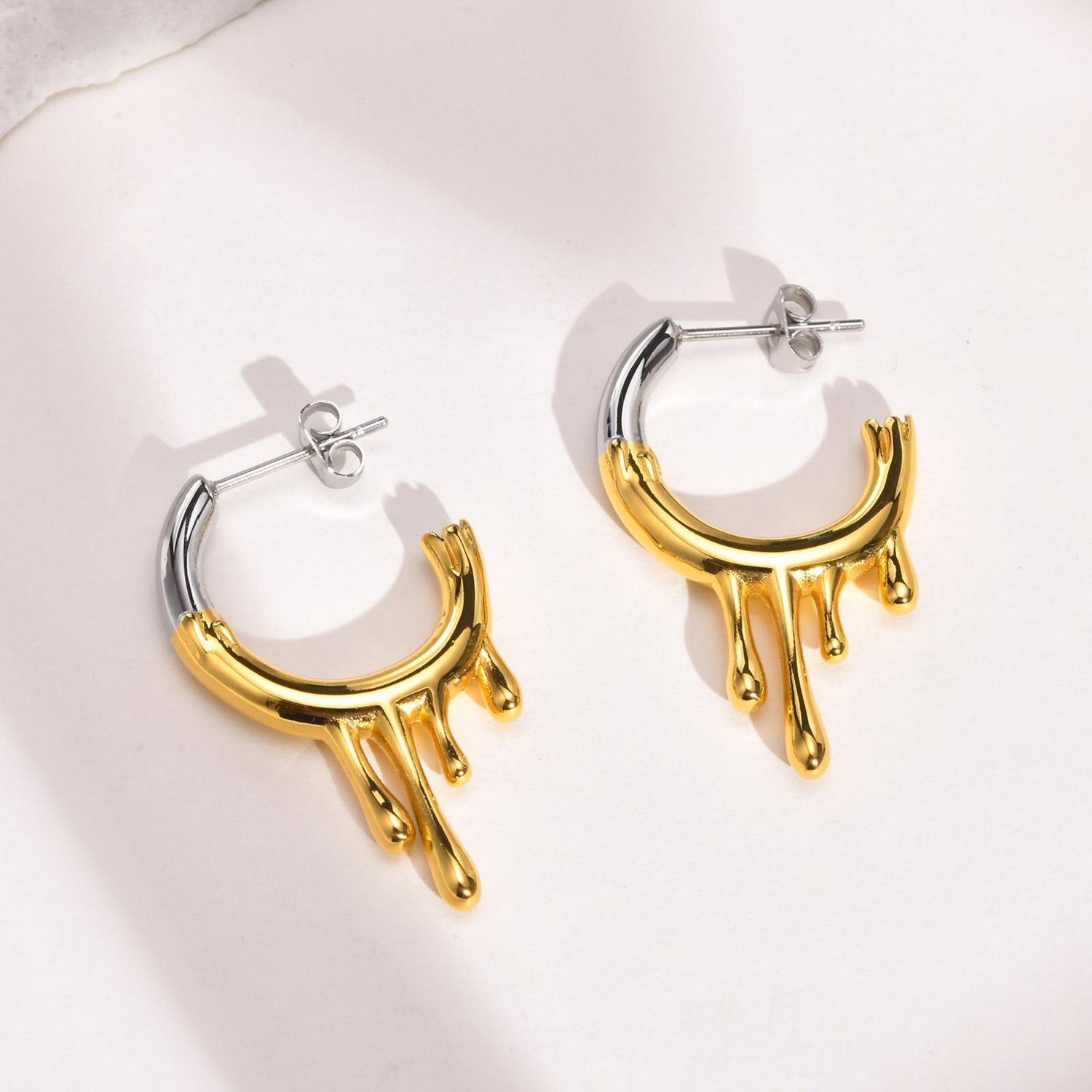 silver and gold earrings