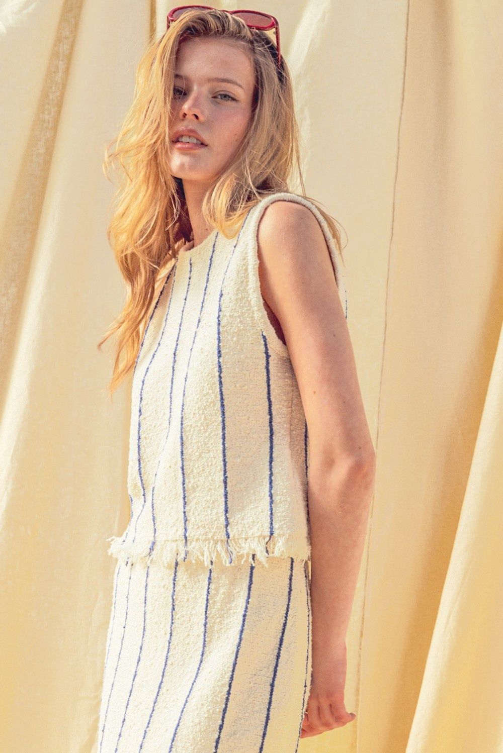 ONDINE TASSEL HEM STRIPE KNIT TOP